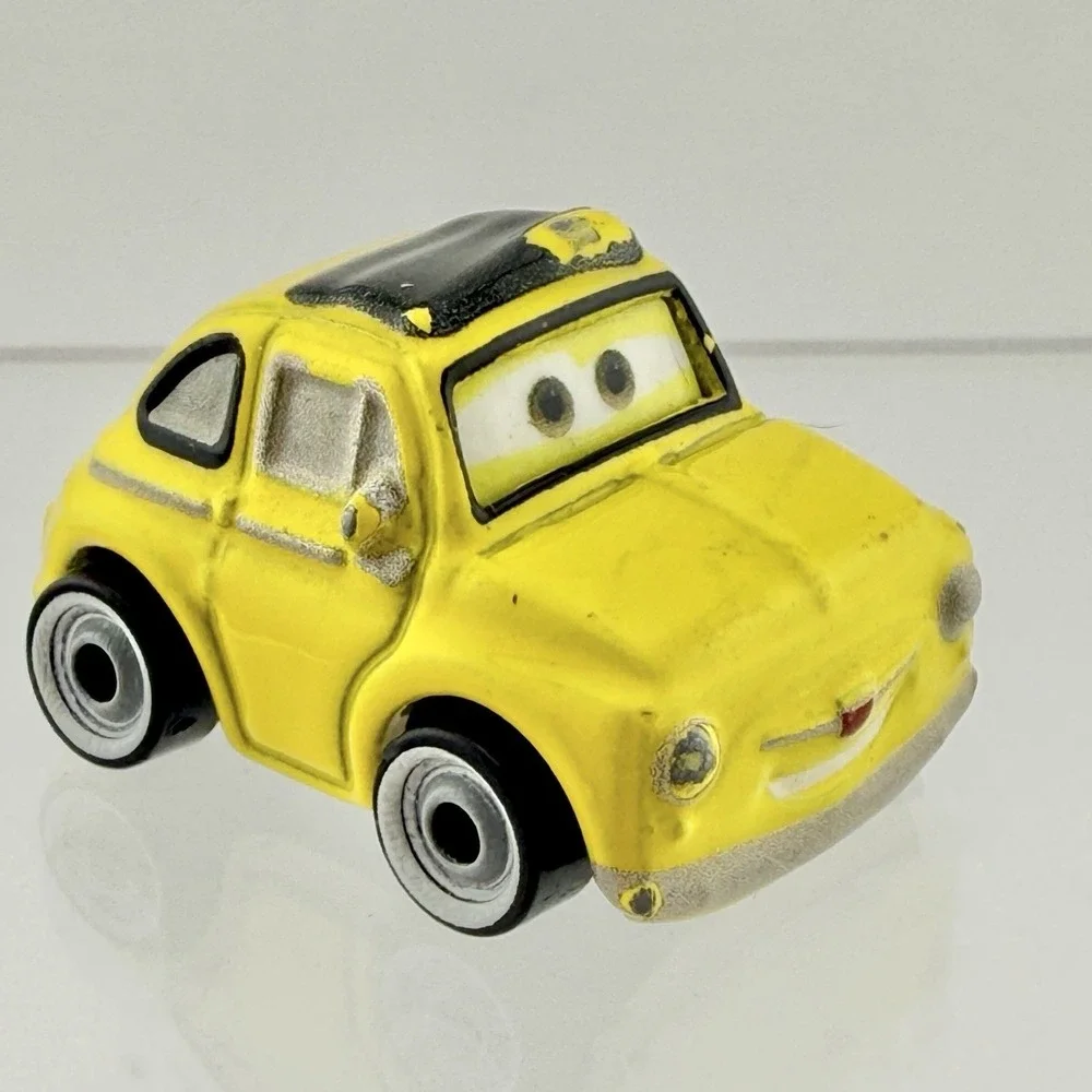Disney Pixar Cars Mini Racers Luigi 2016 Mattel Diecast Car FBG86 Yellow Fiat